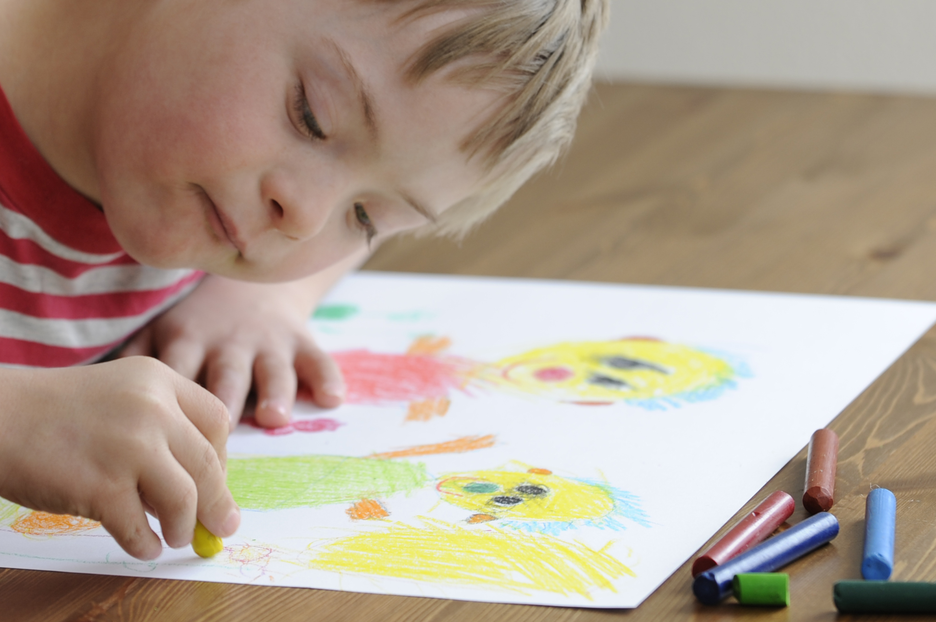 Seven year old boy with Down Syndrome is drawing. More photo's of this boy: [url=http://www.istockphoto.com/file_search.php?action=file&lightboxID=7637215][img]http://www.istockphoto.com/file_thumbview_approve.php?size=1&id=12556002[/img][img]http://www.istockphoto.com/file_thumbview_approve.php?size=1&id=12554213[/img][img]http://www.istockphoto.com/file_thumbview_approve.php?size=1&id=12555845[/img][img]http://www.istockphoto.com/file_thumbview_approve.php?size=1&id=12555667[/img][img]http://www.istockphoto.com/file_thumbview_approve.php?size=1&id=11732977[/img][img]http://www.istockphoto.com/file_thumbview_approve.php?size=1&id=11774445[/img][img]http://www.istockphoto.com/file_thumbview_approve.php?size=1&id=11861829[/img][/url]